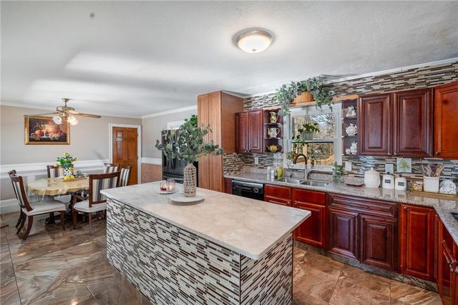 4983 Arcado Rd Sw, House other with 5 bedrooms, 2 bathrooms and 6 parking in Lilburn GA | Image 11