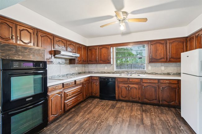 338 S Stewart Ave, Home with 6 bedrooms, 4 bathrooms and 4 parking in Lancaster TX | Image 12