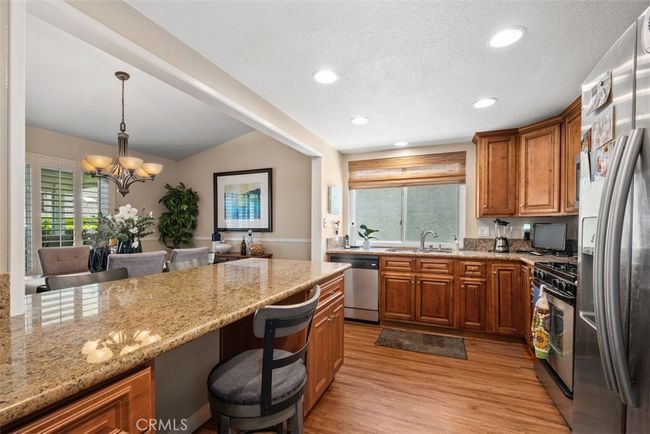 Here you can see the kitchen has been opened up to the dining room space | Image 16