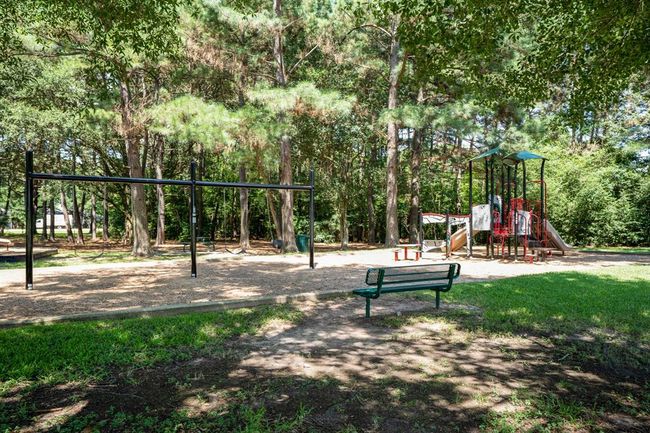 This is one of the many parks located throughout Windrose. There are pocket parks located throughout the community in each of the individual sections. All are offering the perfect shade you need. Walking trails are also located throughout the community. | Image 49