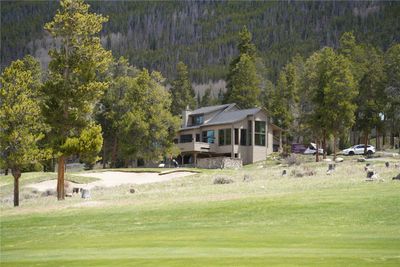 View of nearby features with a lawn | Image 1