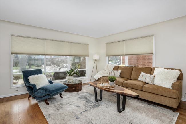 Airy and spacious living room w hardwood floors | Image 4