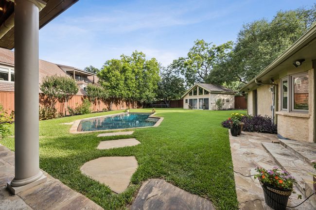 Lush backyard with guest quarters and pool. | Image 30
