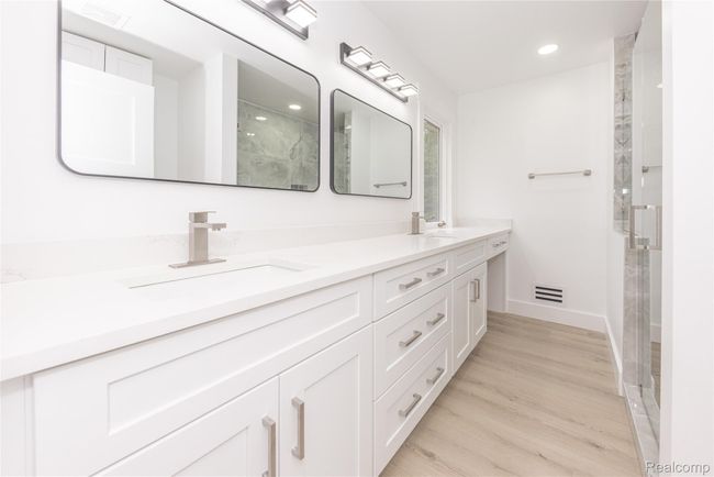 Master Bath with double sink and make-up counter. | Image 12