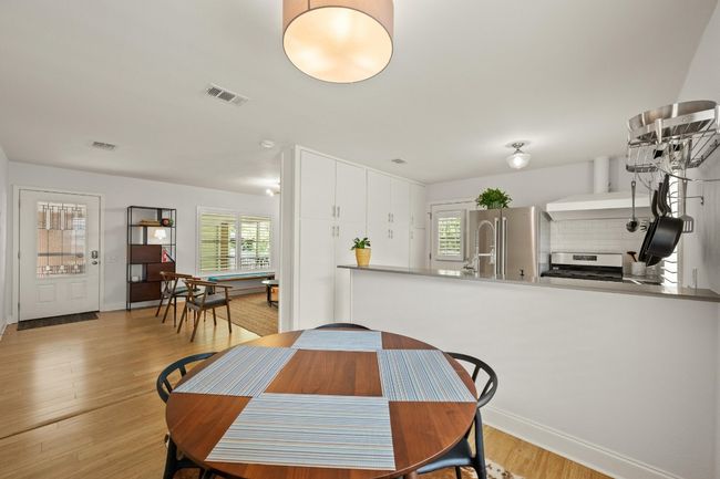 Bamboo floors have been added in 2024, enhancing the homes character and charm. | Image 7