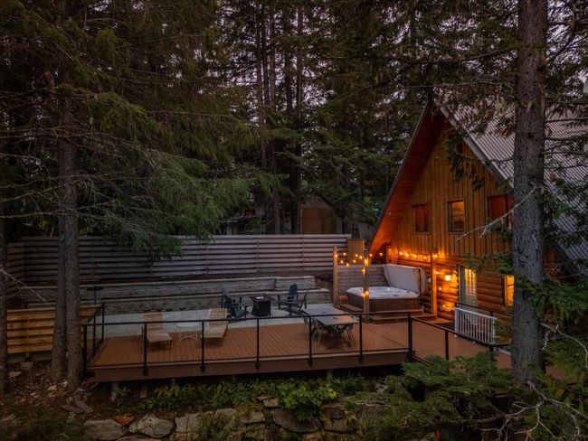 Back of house featuring fence and a deck | Image 4
