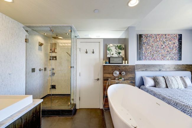 Full bath with a soaking tub, a stall shower, tile patterned floors, and recessed lighting | Image 10