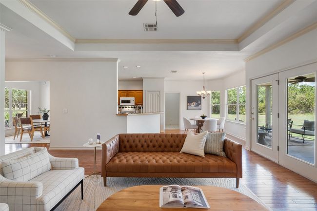 Thoughtfully designed floor plan with effortless flow between living, dining and kitchen spaces. | Image 5