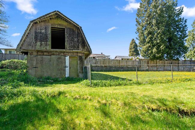 View of barn with fence | Image 38