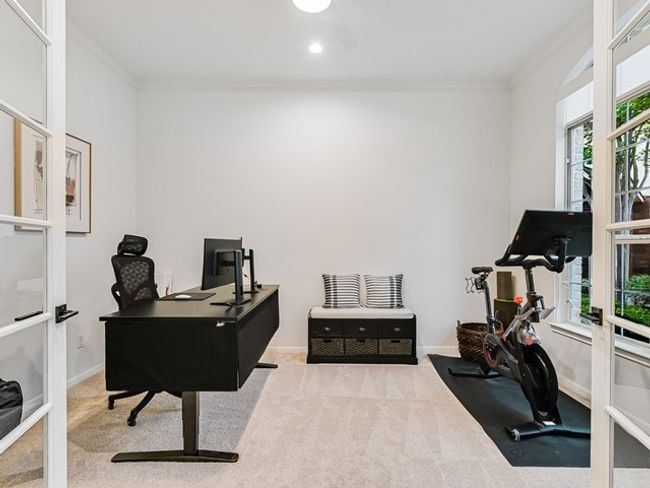 Office space featuring french doors, ornamental molding, carpet, and a healthy amount of sunlight | Image 5
