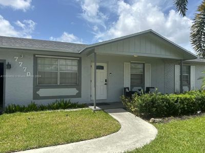 7770 Nw 47th Ct, House other with 3 bedrooms, 2 bathrooms and null parking in Lauderhill FL | Image 3