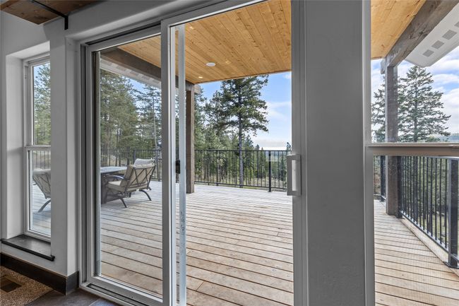 Doorway to outside with visible vents and wood ceiling | Image 18