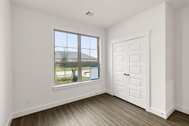 In this home, the secondary bedrooms are not just additional spaces; they’re integral parts of a lifestyle where comfort and style blend seamlessly. It’s where memories will be made, dreams will be nurtured, and everyone will feel right at home. | Image 10