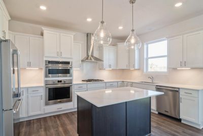 Photo is of the actual home. Just imagine cooking in this kitchen. | Image 3