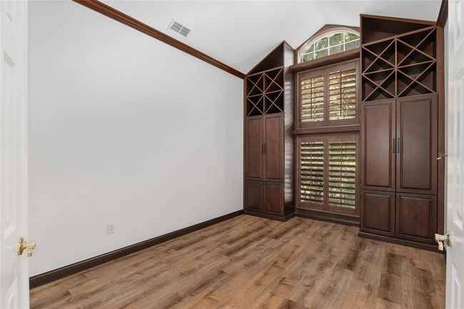 STUDY WITH VAULTED CEILINGS AND BUILT-INS | Image 35