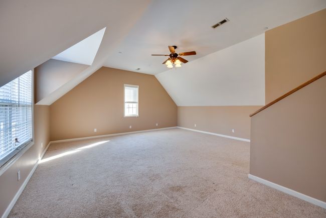 Upstairs bonus room could be converted to an additional bedroom, play room, or man cave. | Image 30
