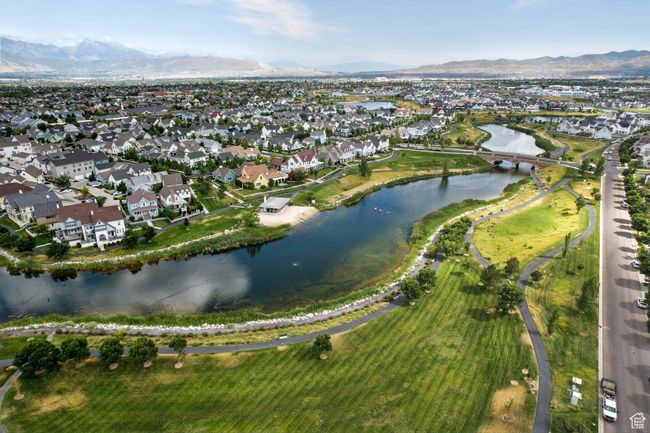 Aerial view of property and surrounding area with nearby suburban area and a water and mountain view | Image 54