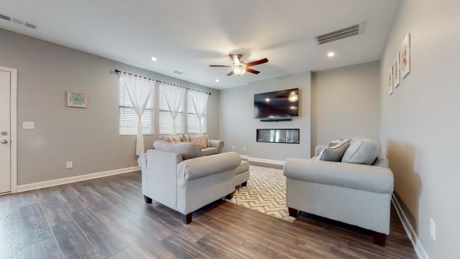 Living room with modern electric fireplace built in | Image 14