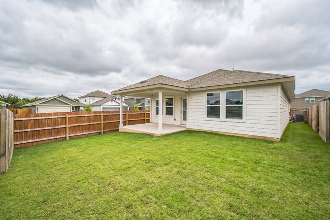 Back of property featuring a patio area and a fenced backyard | Image 15