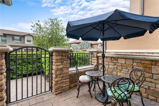 View of patio featuring a gate | Image 23
