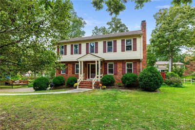 Welcome to 1708 Pocoshock Blvd. in the Surreywood Subdivision. Brick and Vinyl Exterior, Storm Windows and Doors and 7 year old Roof. | Image 1