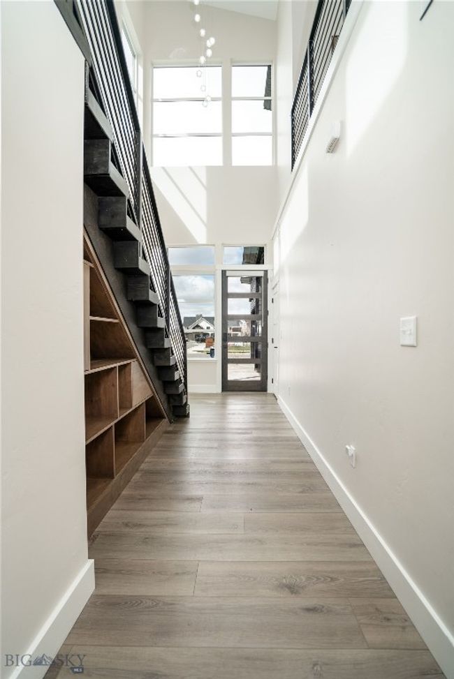 Entryway - 27ft cathedral ceiling with large windows for fantastic natural light. | Image 8