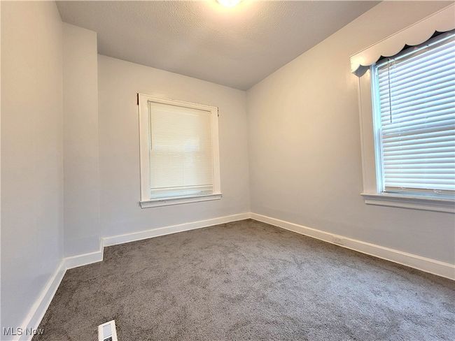 2nd bedroom with carpet on the first floor. | Image 6