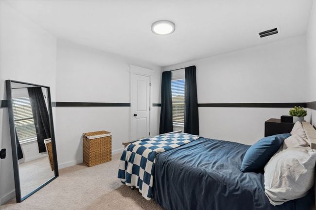 Custom wall accents are also found in the third bedroom. | Image 26