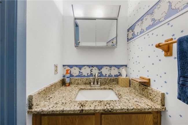 Bathroom featuring vanity | Image 14