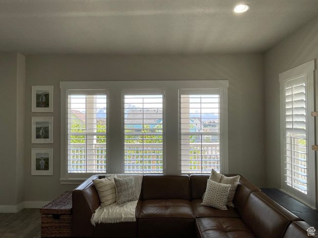 Living room featuring amazing views and plantation shutters | Image 22
