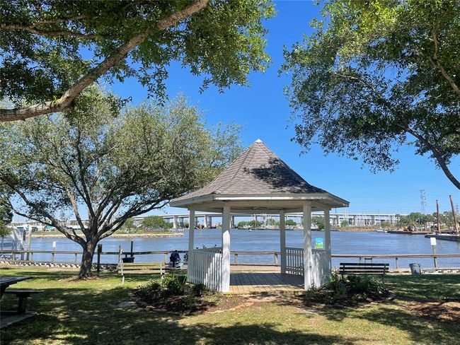 Discover Deep Hole Park, perfect for fishing and family fun with its inviting play structure. | Image 49