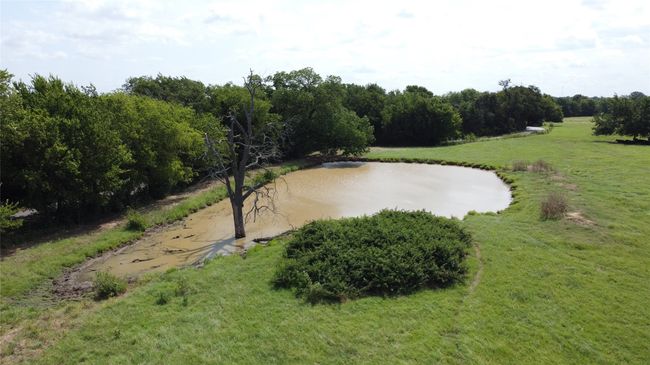 View of property's community with a water view and a yard | Image 8