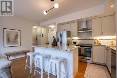 303 - 15 Sousa Mendes St, Townhouse with 2 bedrooms, 2 bathrooms and 1 parking in Toronto ON | Image 2