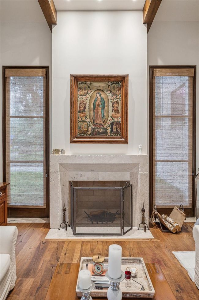 Views to the to large verdant grounds from the living room. | Image 15