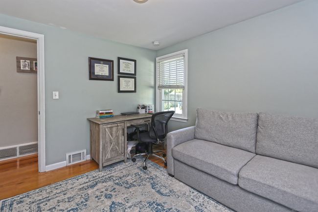 Main level bedroom can be used as an office. | Image 19