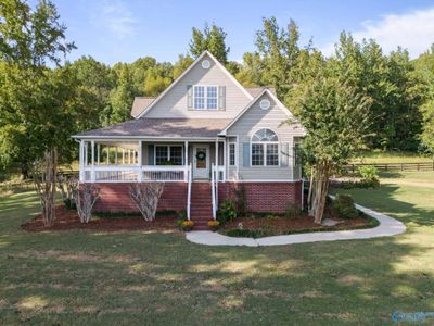 Beautiful wrap around porch w/ view of the valley | Image 1