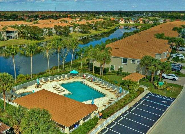 View of swimming pool featuring a water view | Image 14