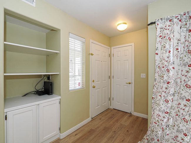 Entrance foyer with baseboards and light wood-type flooring | Image 7