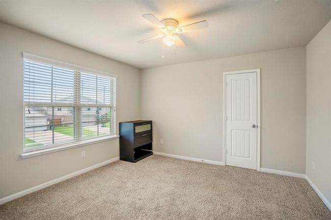 The third bedroom upstairs is huge and has a nice size cloet and good views. | Image 32