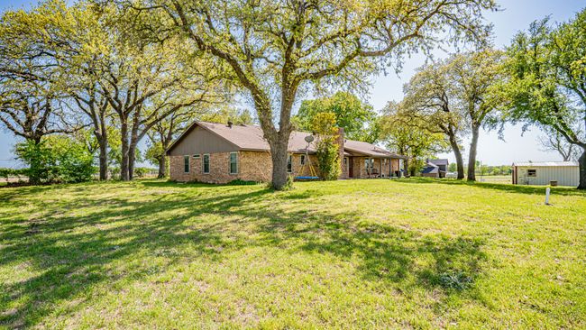 View of yard featuring an outdoor structure | Image 33