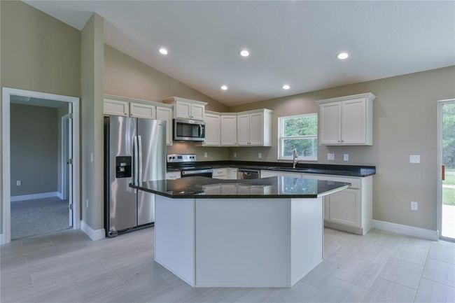 12805 Sw 38 Th Cir, House other with 4 bedrooms, 2 bathrooms and null parking in OCALA FL | Image 12
