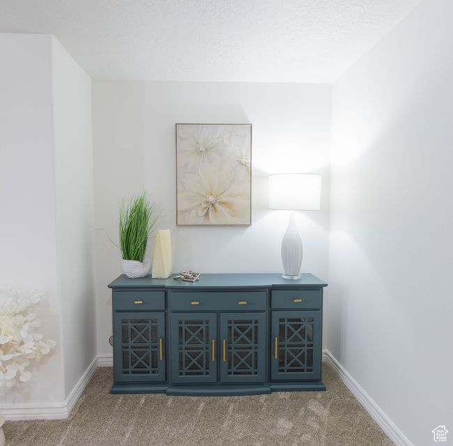 Detailed view of carpet floors and baseboards | Image 43