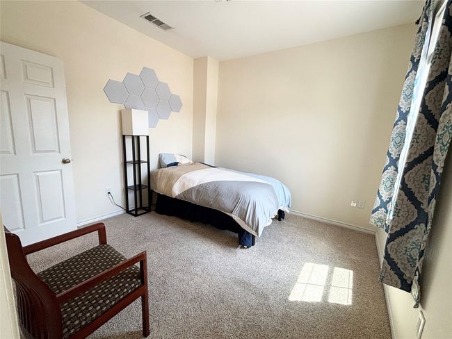 Bedroom featuring carpet flooring and baseboards | Image 11