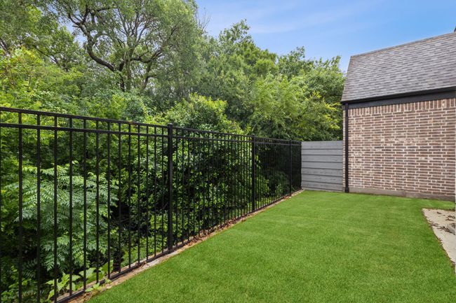 View of fenced backyard | Image 5