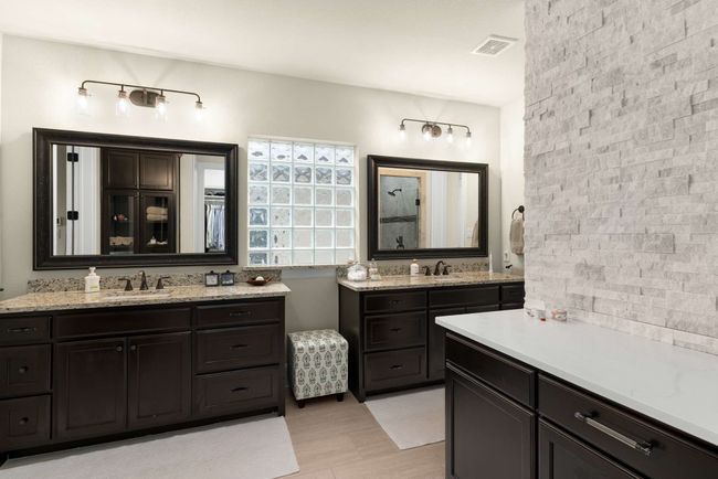 Extra counter space for storage. Plumbing is below cabinet if buyer chooses to add tub. | Image 21