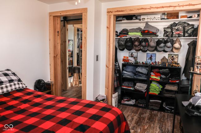 bedroom featuring wood finished floors | Image 17