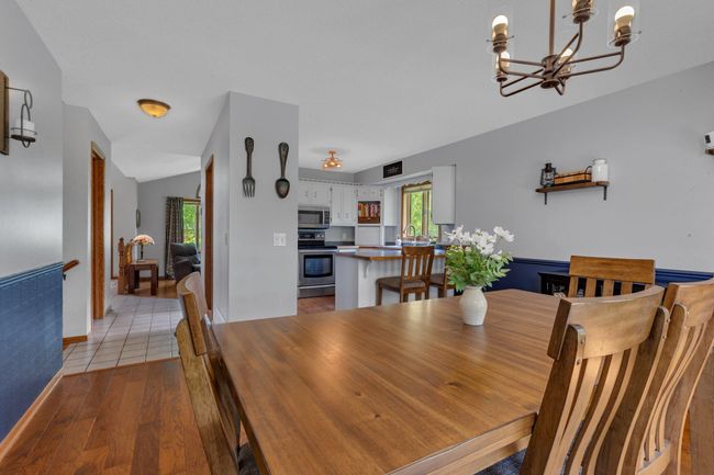 Kitchen & dining room that flows out to a paver patio | Image 9