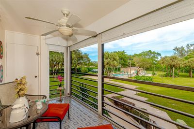 HAVE YOUR MORNING COFFEE ON SCREENED BALCONY!! | Image 2