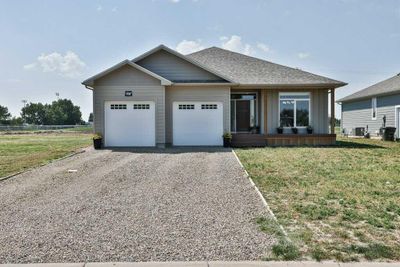 599 4 St N, House detached with 3 bedrooms, 2 bathrooms and 4 parking in Vauxhall AB | Image 1