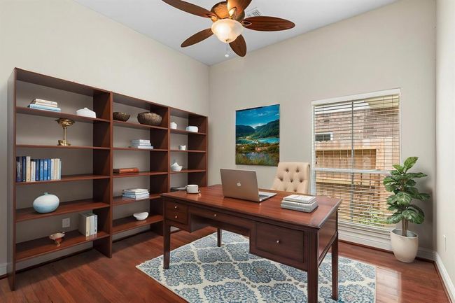The second bedroom has been staged to look like an office. | Image 26